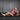 Black medicine ball with brand logo for workout exercises, grippy leather-texture material